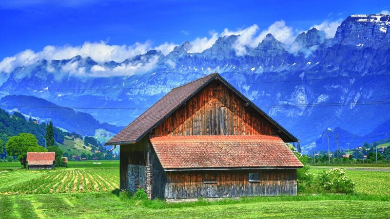 Wooden Barn in Field — Green, Serene, Afternoon, Photograph, Mountains, Fields