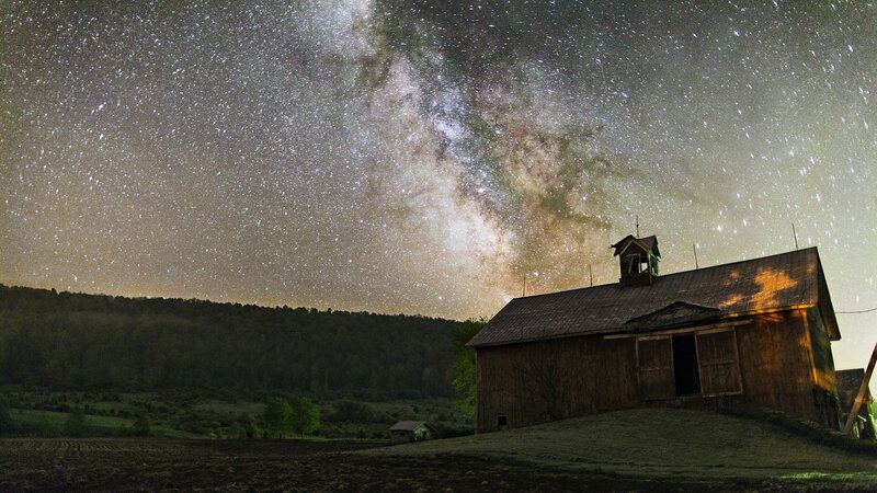 Wooden Barn under Stars