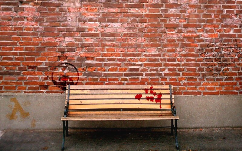 Wooden Bench Against Brick Wall — Red
