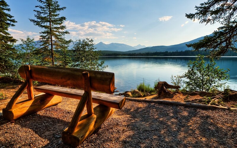 Wooden Bench by Lake — Blue, Serene, Afternoon, Photograph, Mountains