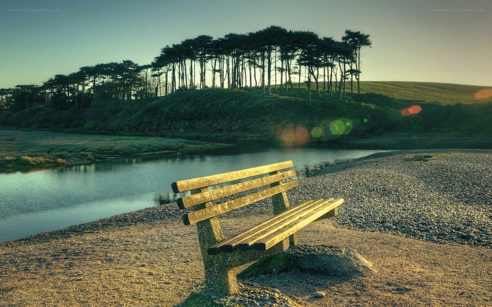 Wooden bench by the river