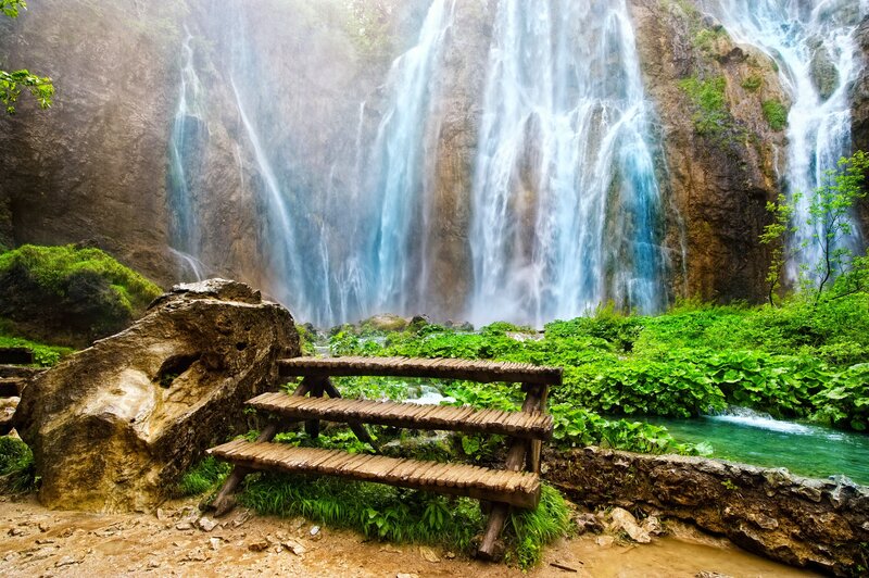 Wooden Bench by Waterfall — Green, Serene