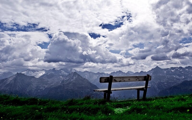 Wooden Bench in Mountains — Green, Dramatic, Afternoon, Photograph, Clouds
