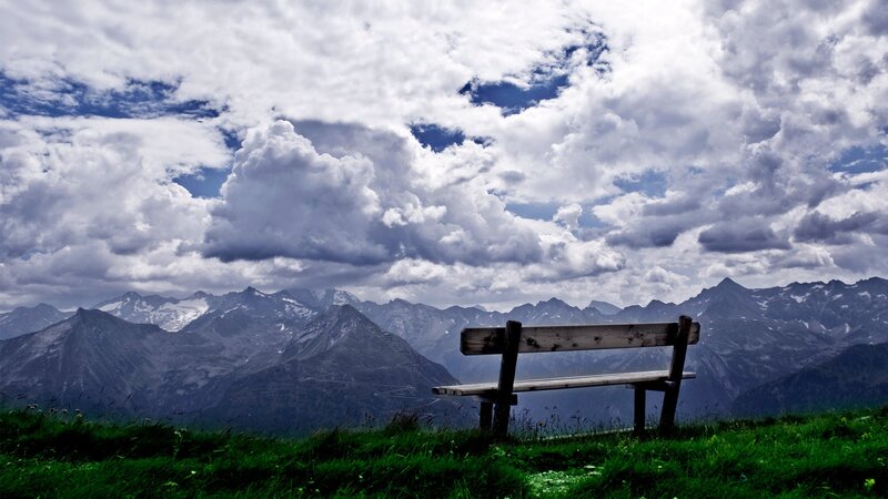 Wooden Bench in Mountains — Green, Serene, Afternoon, Photograph, Clouds