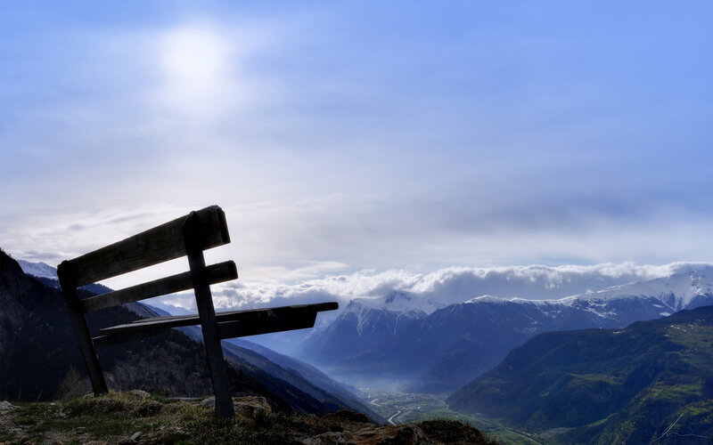 Wooden Bench in Mountains