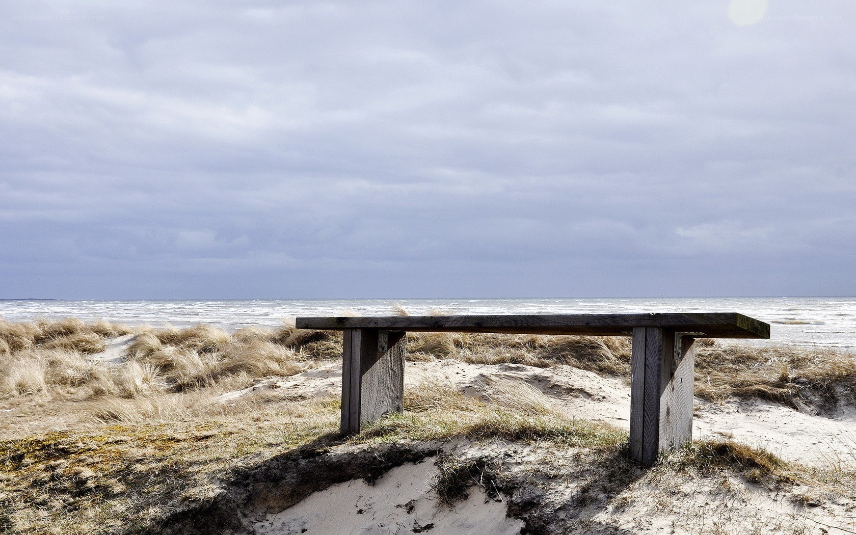 Wooden bench on a beach
