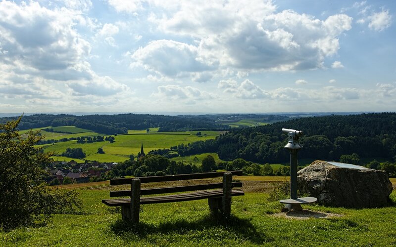 Wooden Bench on Hill — Green, Serene, Afternoon, Photograph, Binoculars