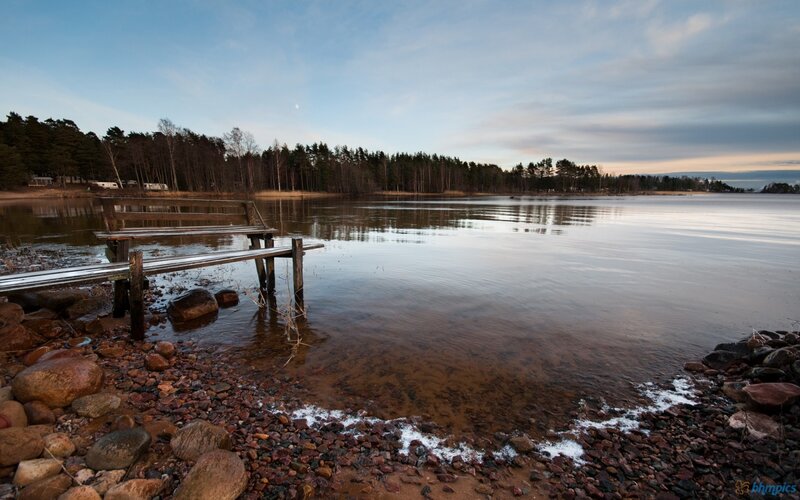 Wooden Bench on Lake Shore