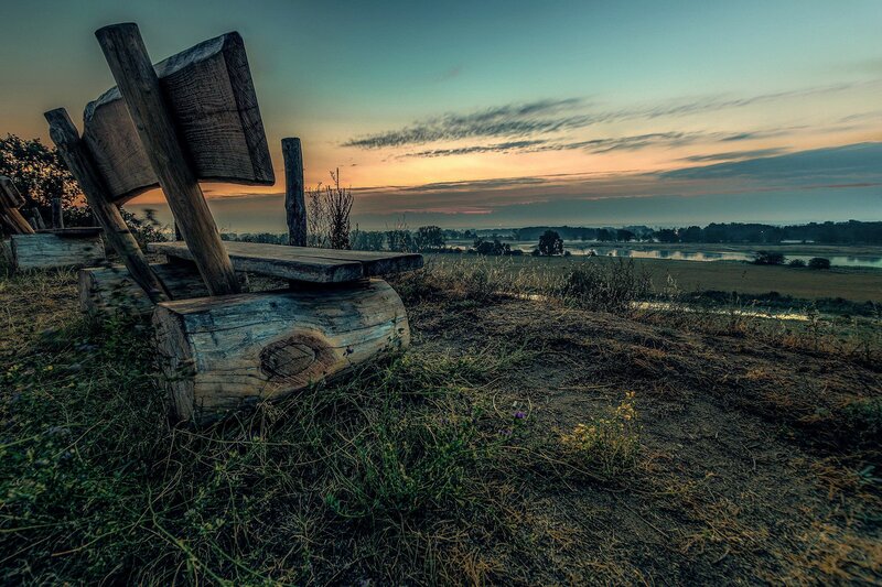 Wooden Bench Overlooking River