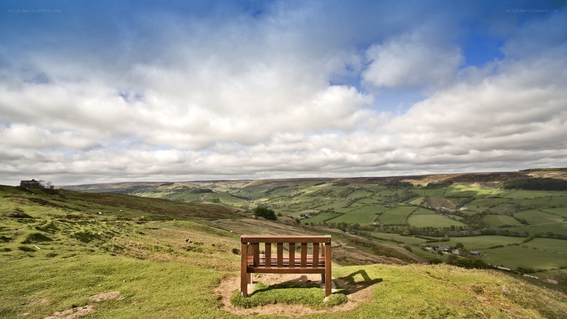 Wooden bench overlooking valley