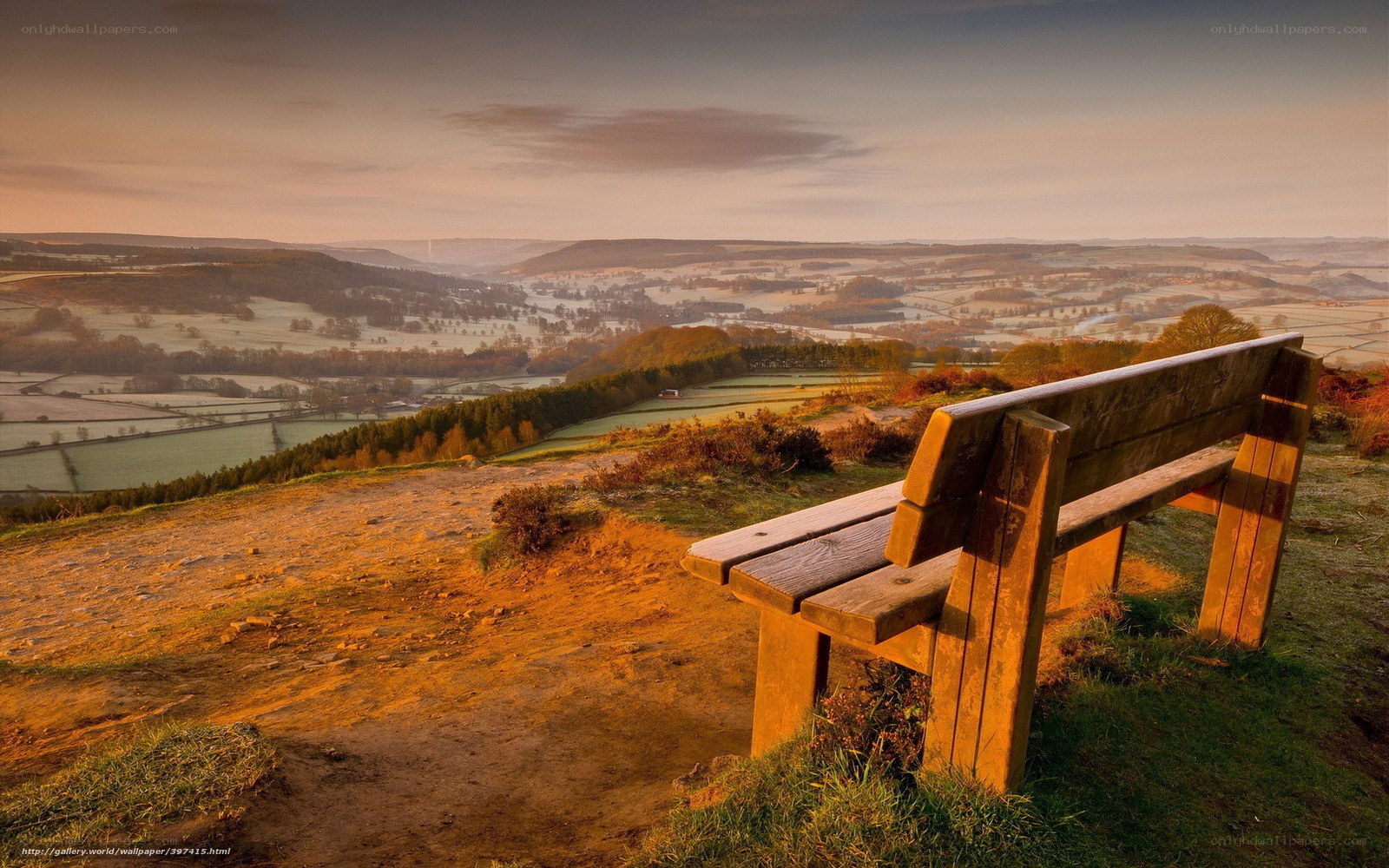 Wooden bench overlooking valley