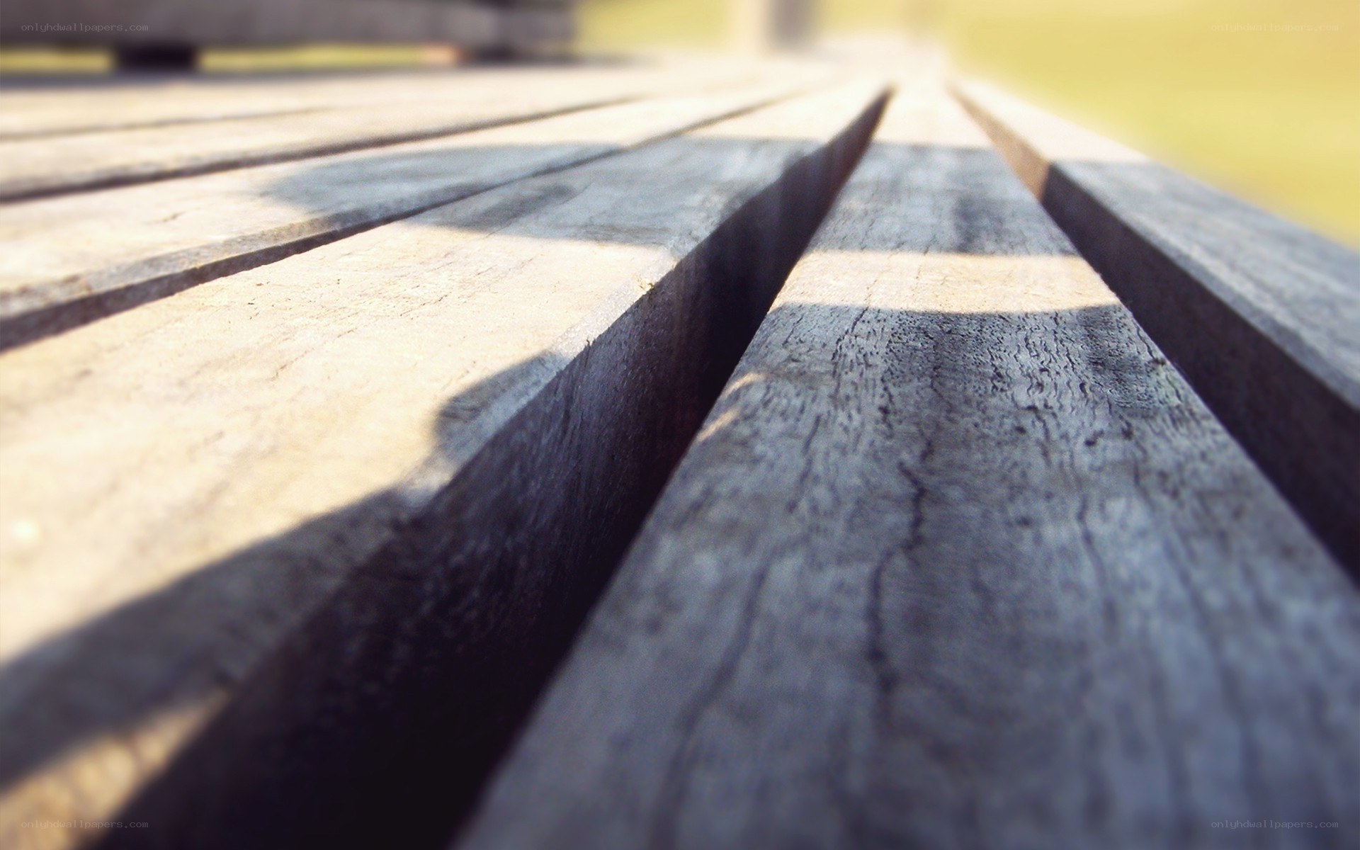 wooden bench planks in sunlight