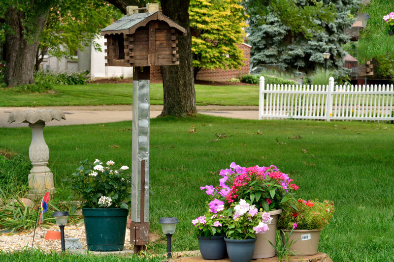Wooden Birdhouse in Garden
