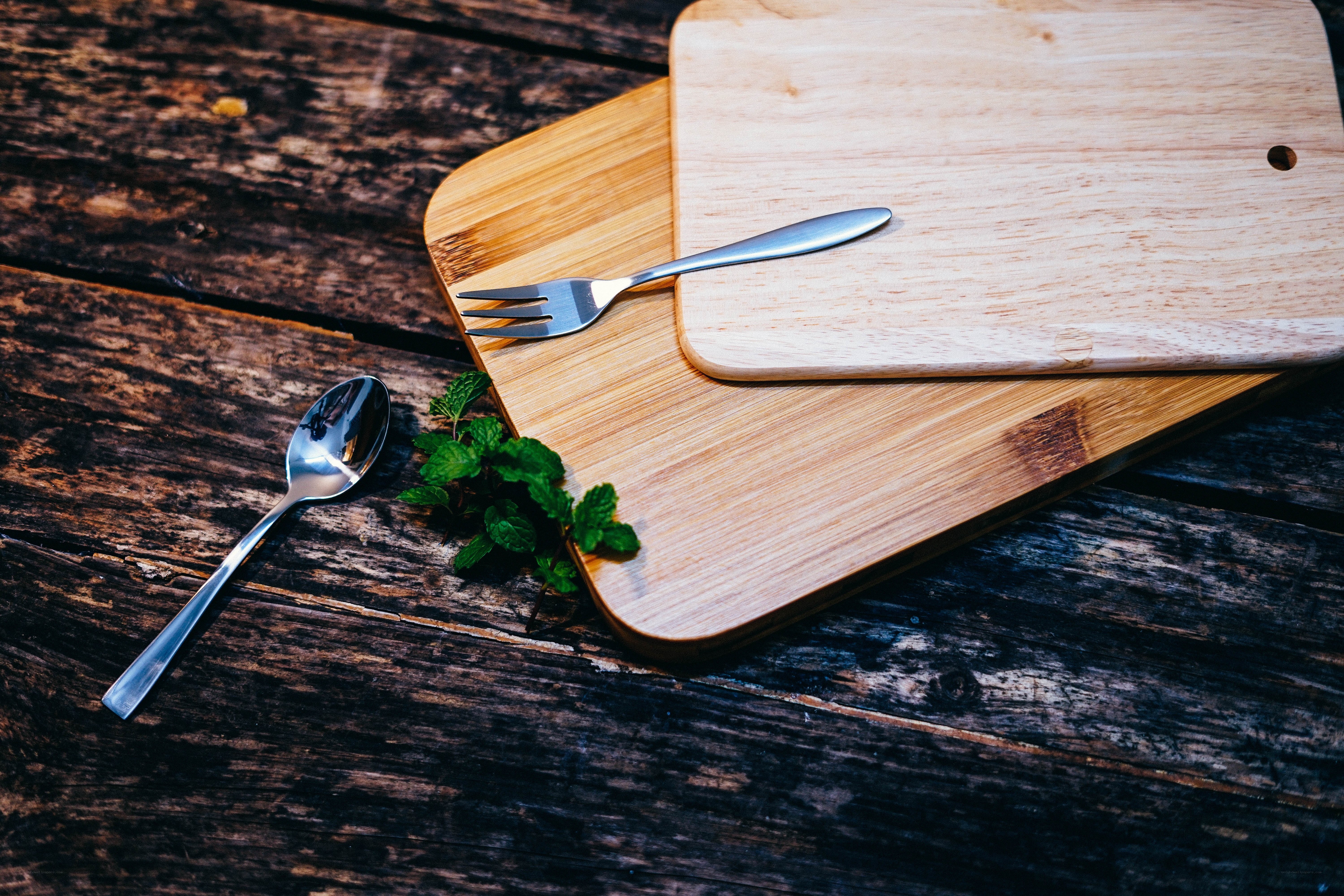 Wooden boards with cutlery