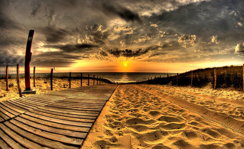 Wooden boardwalk at sunset