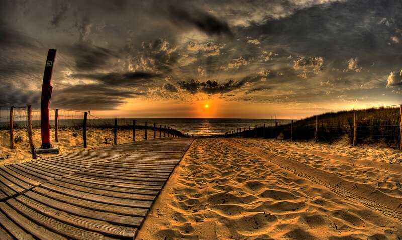 Wooden boardwalk at sunset