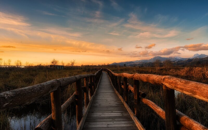 Wooden Boardwalk in Marsh — Orange, Serene, Sunset
