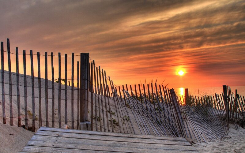 Wooden Boardwalk on Beach — Orange, Dramatic, Sunset, Photograph, Fence, Sand Dune, Sun
