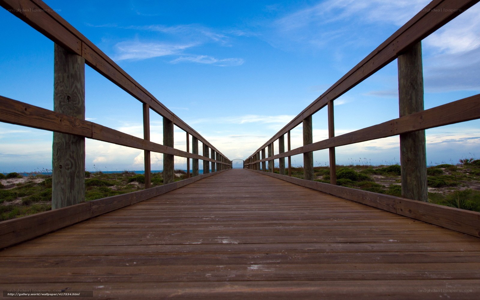 Wooden boardwalk to the beach