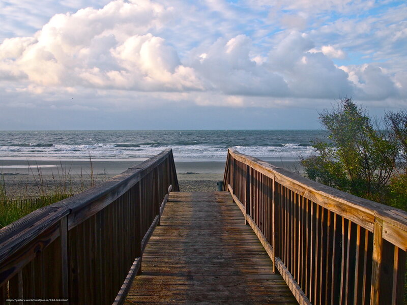 Wooden boardwalk to the beach