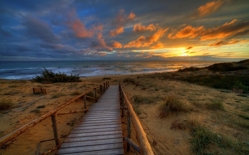 Wooden boardwalk to the beach
