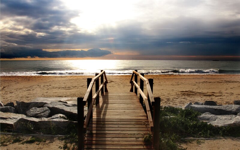 Wooden boardwalk to the beach