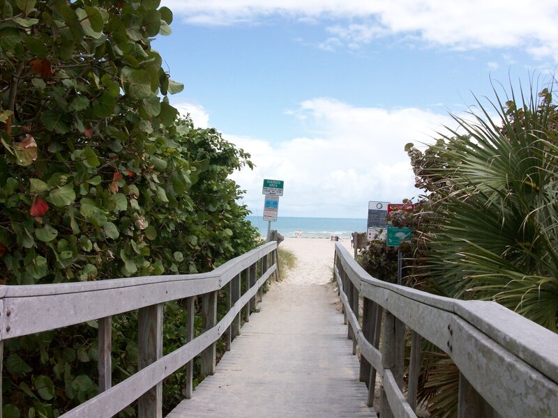 Wooden boardwalk to the beach