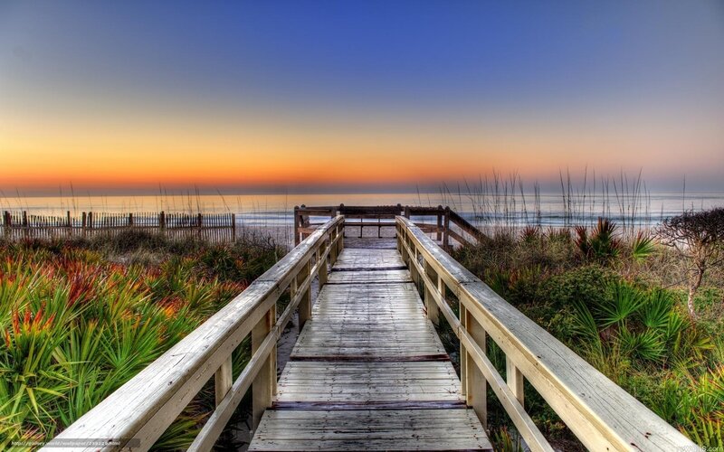 Wooden boardwalk to the beach