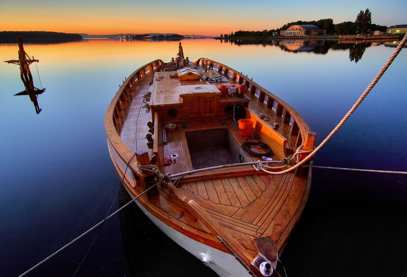 Wooden Boat at Sunset — Orange