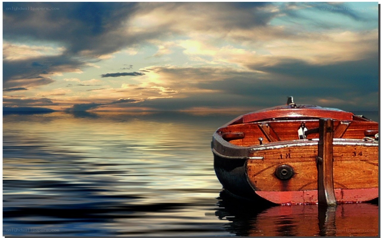 Wooden boat at sunset