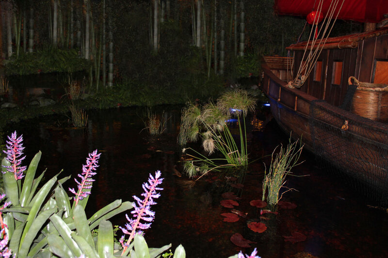 Wooden Boat in Pond