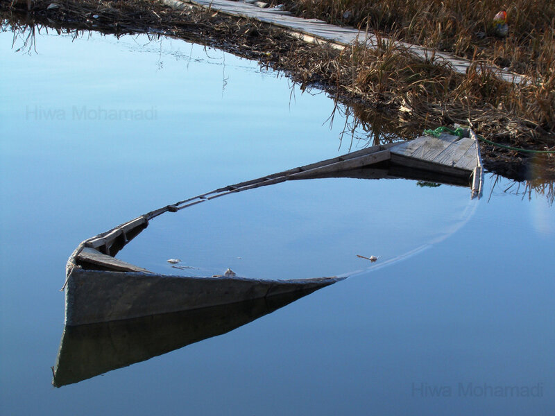 Wooden Boat in Water