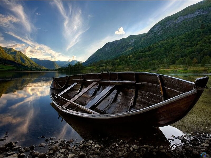 Wooden boat on a calm lake