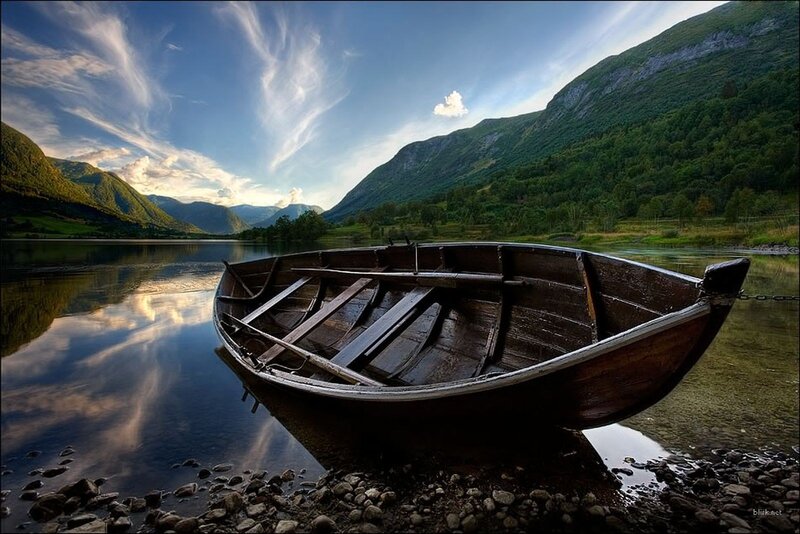 Wooden boat on a calm lake