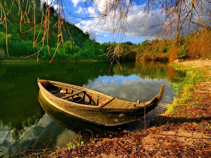 Wooden boat on a calm river