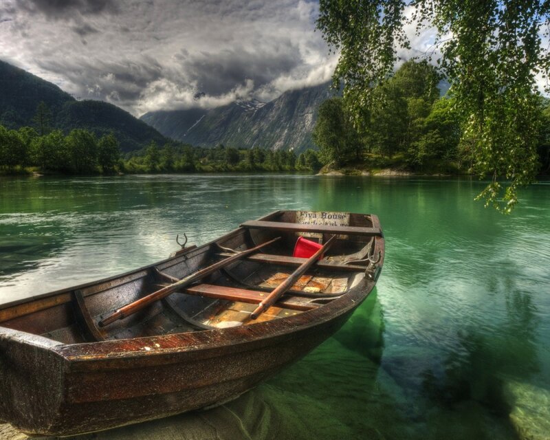 Wooden boat on a serene lake