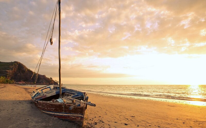 Wooden Boat on Beach — Gold, Serene, Sunset