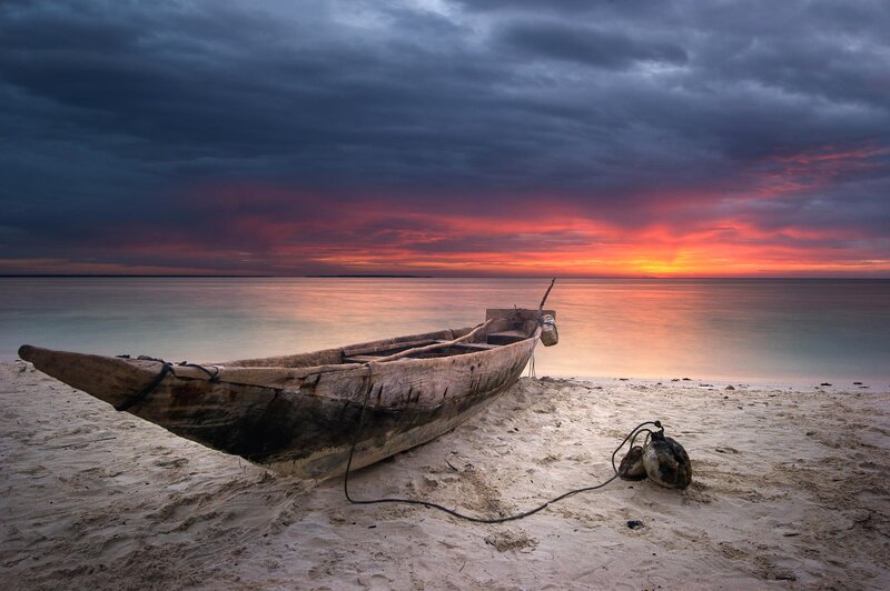 Wooden Boat on Beach — Orange, Dramatic, Sunset, Photograph, Sky