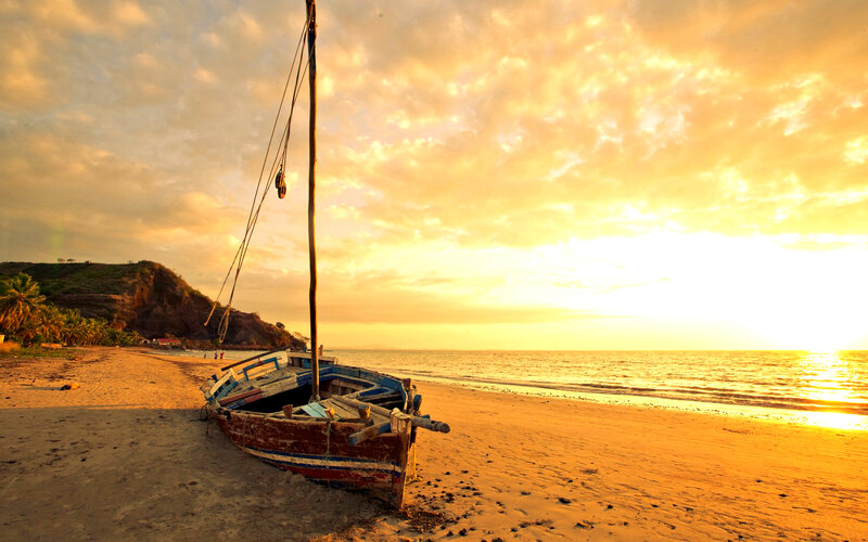 Wooden Boat on Beach — Orange