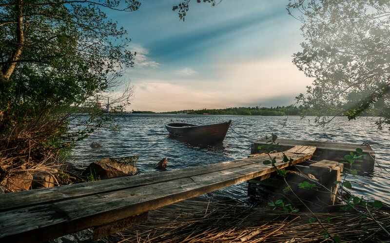 Wooden Boat on Lake — Blue, Serene, Sunset, Photograph, Dock