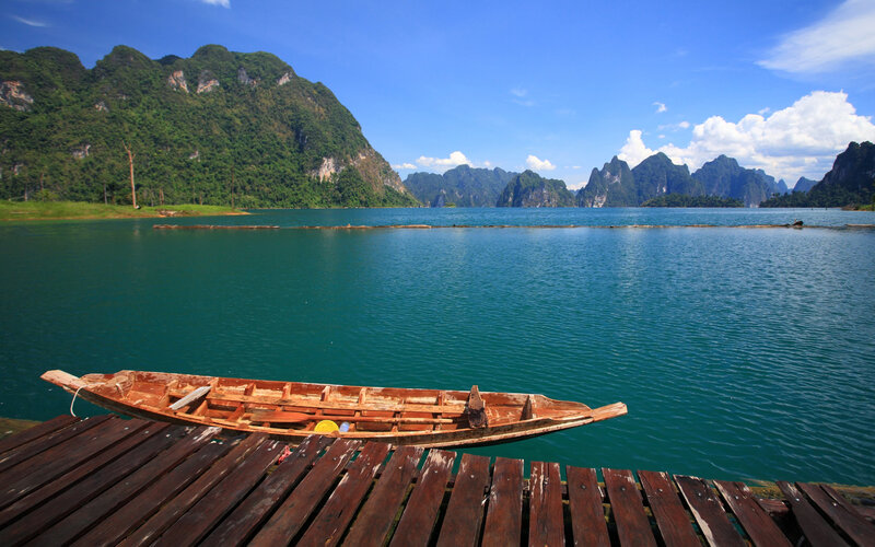 Wooden Boat on Lake — Blue