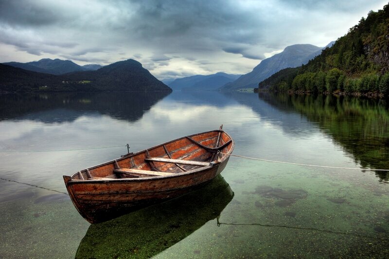 Wooden Boat on Lake — Green, Serene, Photograph