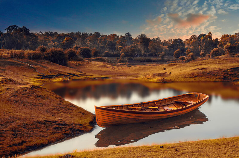 Wooden Boat on River — Brown