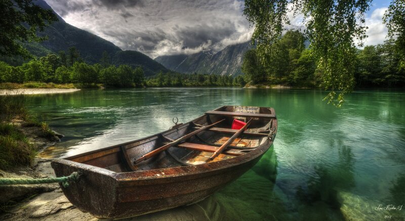 Wooden Boat on River — Green, Serene, Afternoon, Photograph, Mountains