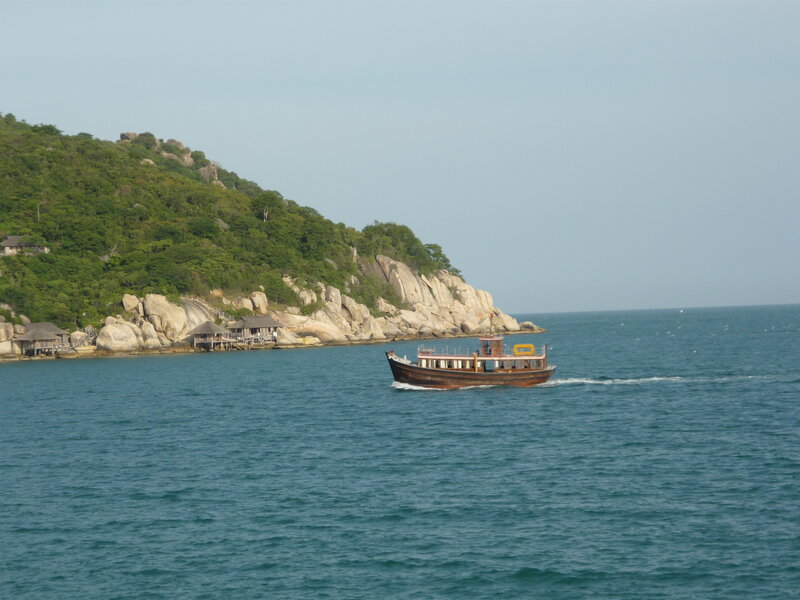 Wooden Boat on Water — Blue, Calm