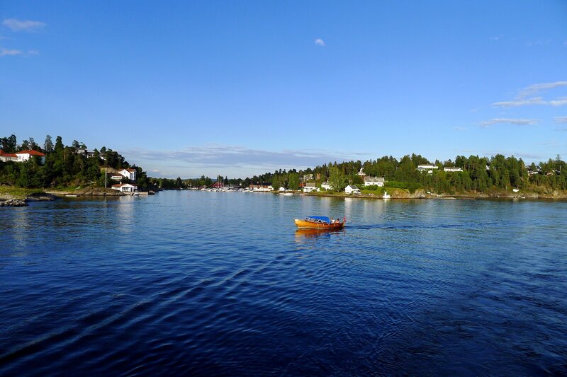 Wooden Boat on Water — Blue, Serene
