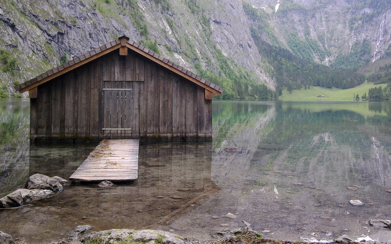 Wooden boathouse on a mountain lake