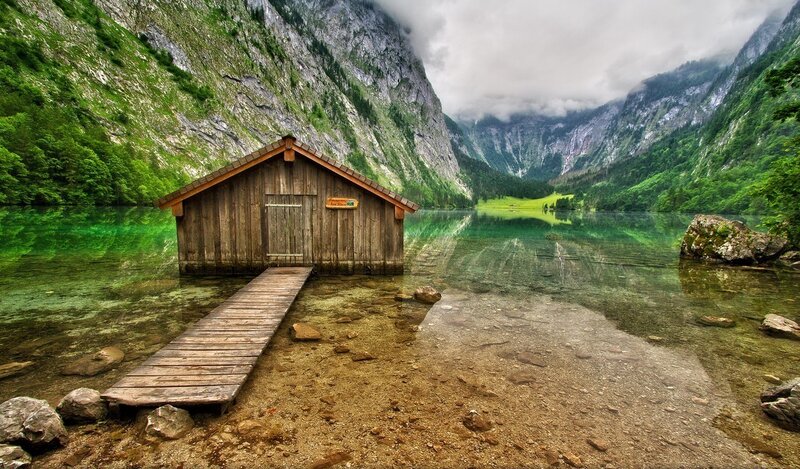 Wooden boathouse on a mountain lake