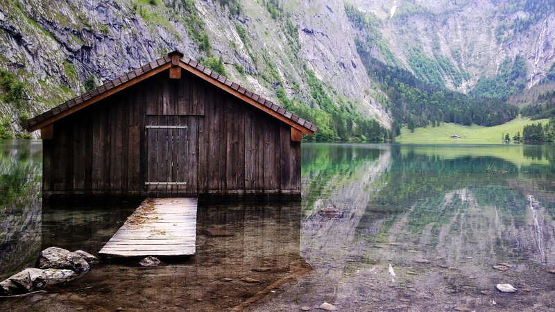 Wooden boathouse on a mountain lake