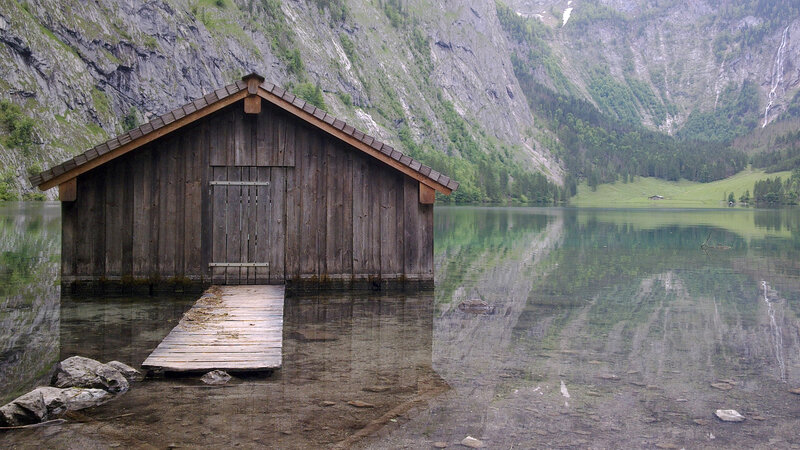 Wooden boathouse on a mountain lake